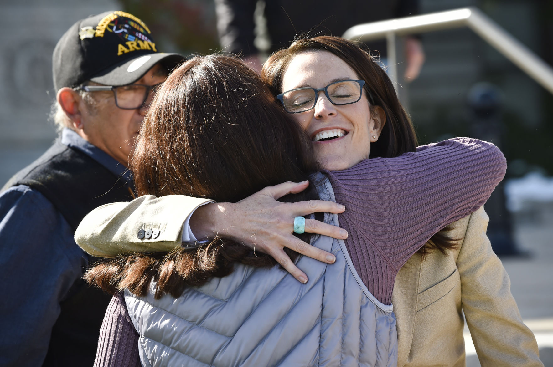 Williams hugs a supporter Thursday at the State Capitol.
